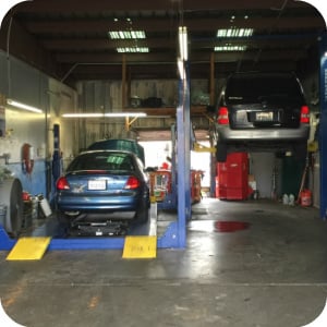 A car on the lift in the Todd's Car Connection shop